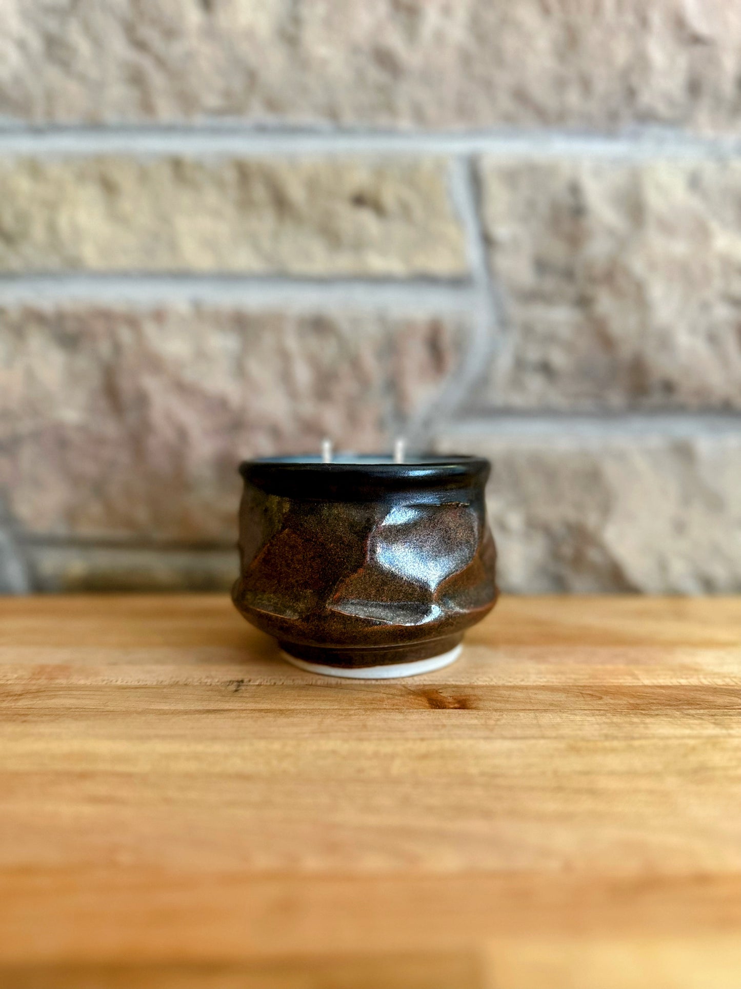 Black and brown pottery candle #3